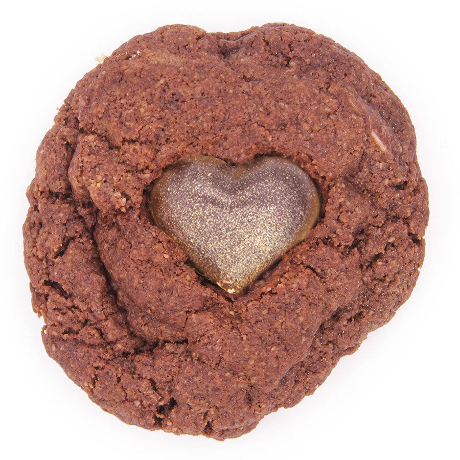 vegan gluten free triple chocolate cookie with chocolate heart decoration